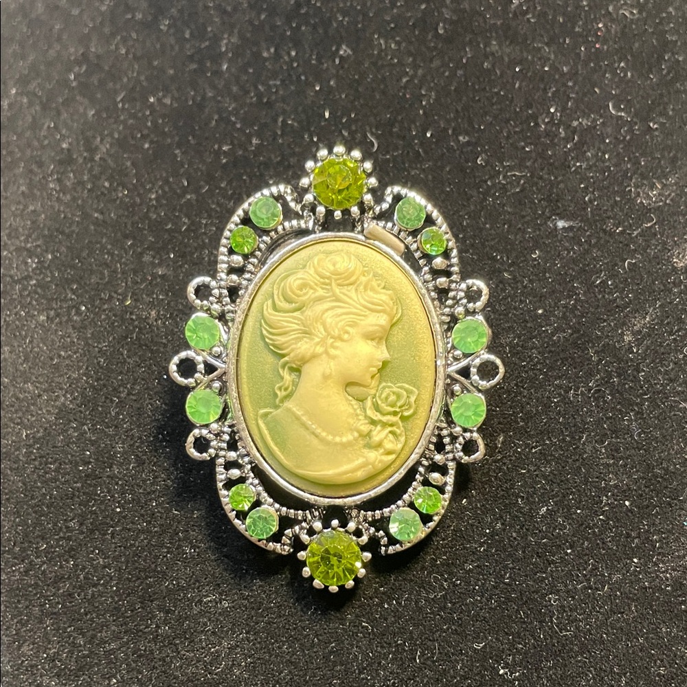 Elegant Silver and Green Cameo Brooch